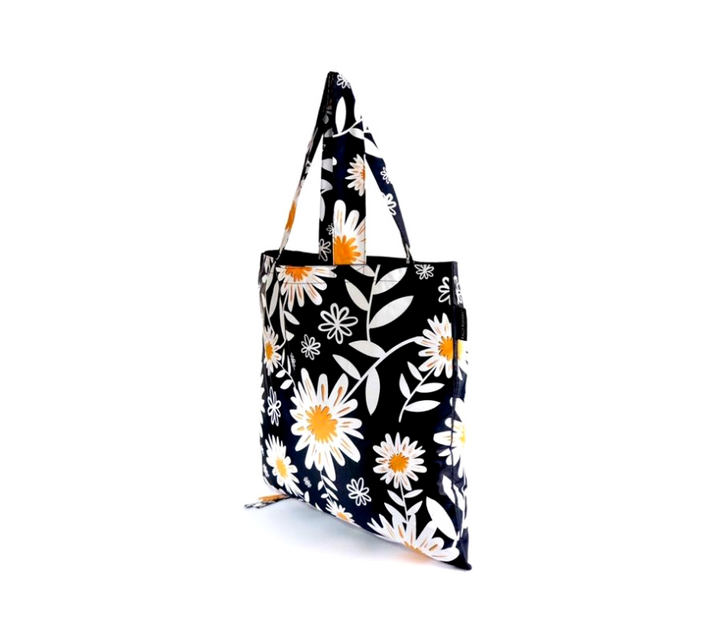 Side view of hanging daisy print bag
