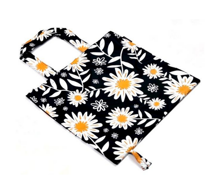 Side view daisy print grocery bag, shopping bag and tote