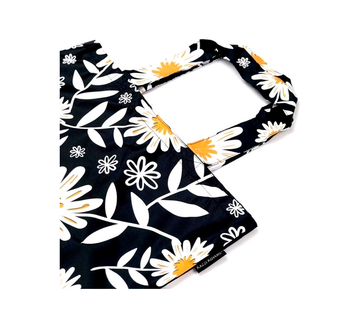 Kazzi Kovers logo on daisy print bag