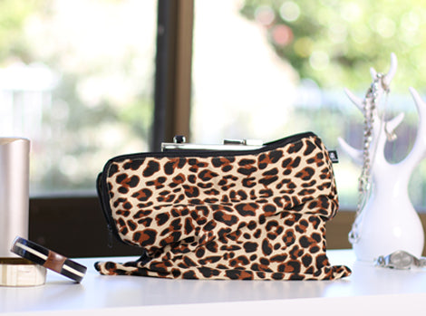 Leopard print clutch dust bag