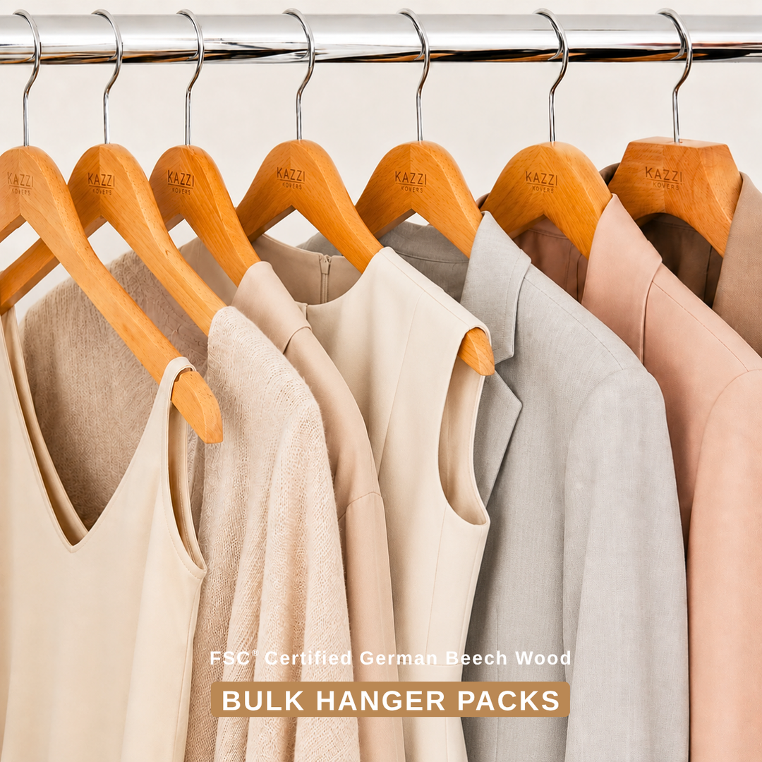 Wooden hangers in various packs for wardrobe organisation and garment support.