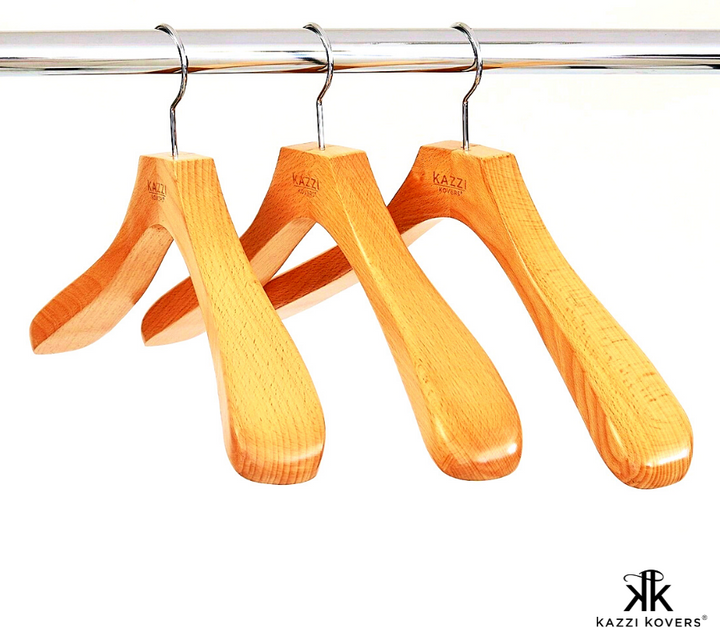 Solid and dense wooden coat hangers with contoured shoulders to support the heaviest of garments | Kazzi Kovers