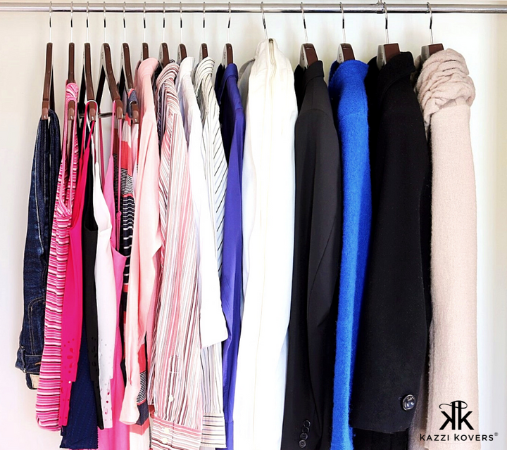 Bulk hangers lined up on wardrobe rail with various garments | Kazzi Kovers