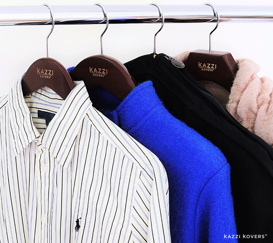 Stylish garments organised on rack with Kazzi Kovers walnut wooden hangers