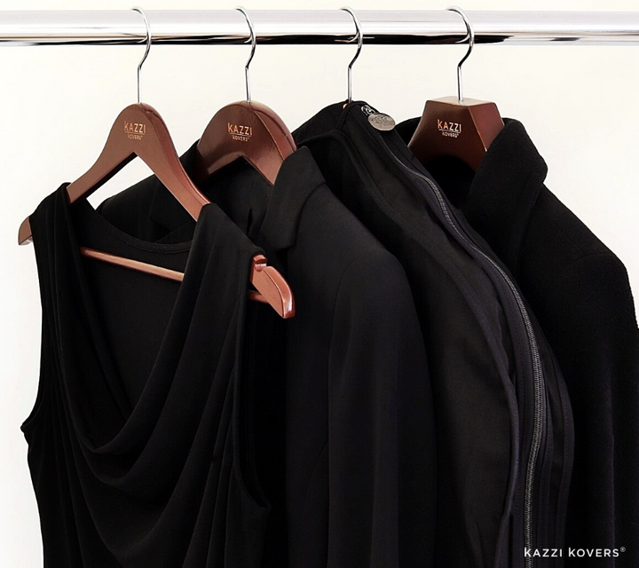 Black garment bag with walnut wooden hangers