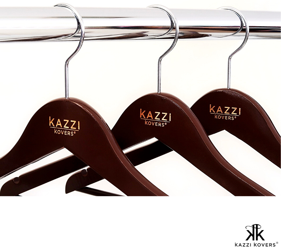 Kazzi Kovers engraved ogo on walnut clothing hangers