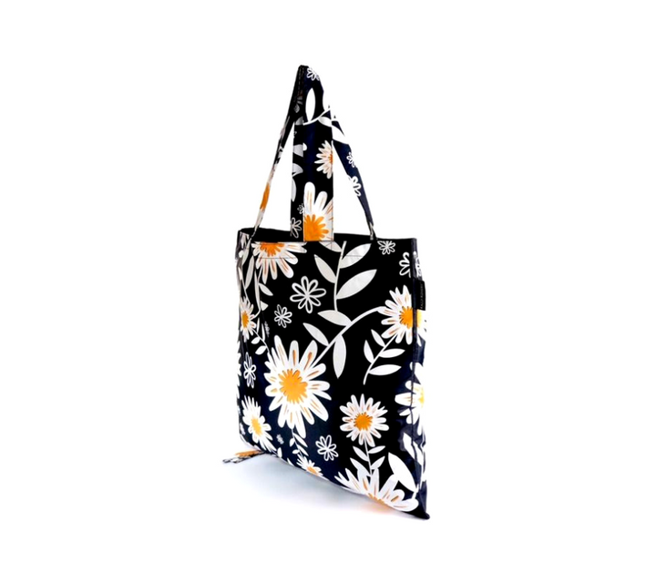 Side view of foldable bag in pretty Daisy Print