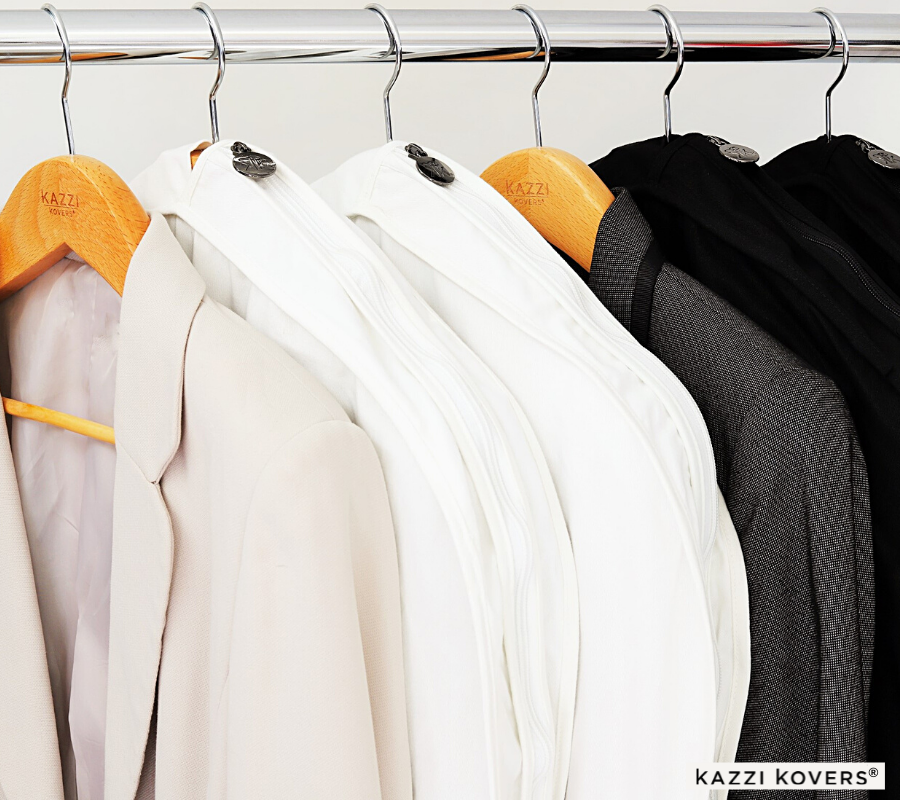 Stylish garment covers organised neatly on a metal rack