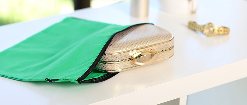 Green clutch and wristlet cotton dust bags for storage