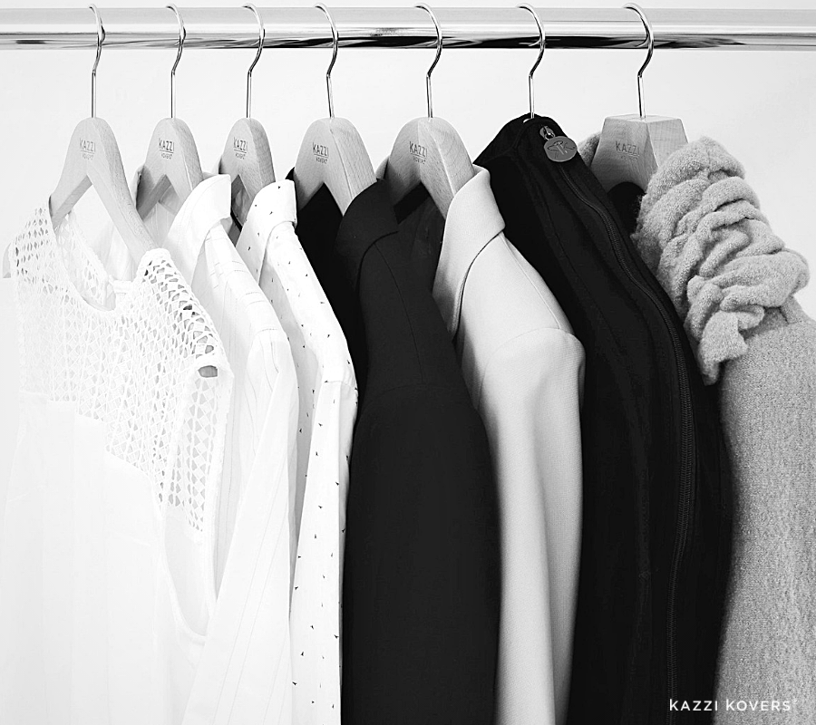 Kazzi Kovers black garment displayed on rack with other clothing