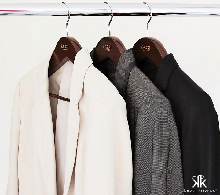 Premium wooden jacket hangers with contoured shoulders for extra support