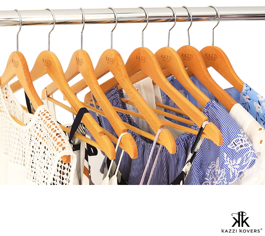 Natural wood grain hangers displaying various garments in blue and white hues