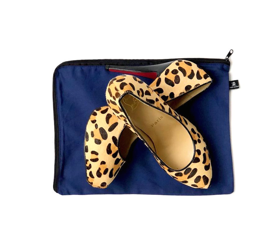 Leopard print shoes with blue shoe bag