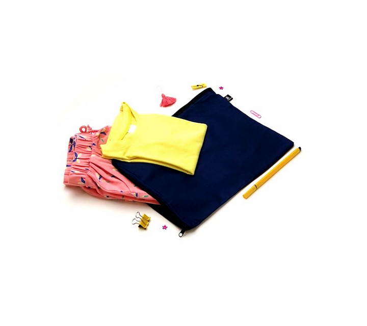 Children's clothes and accessories in navy bag