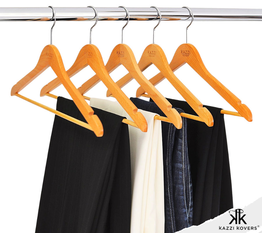 Organised jeans and pant hangers on rack