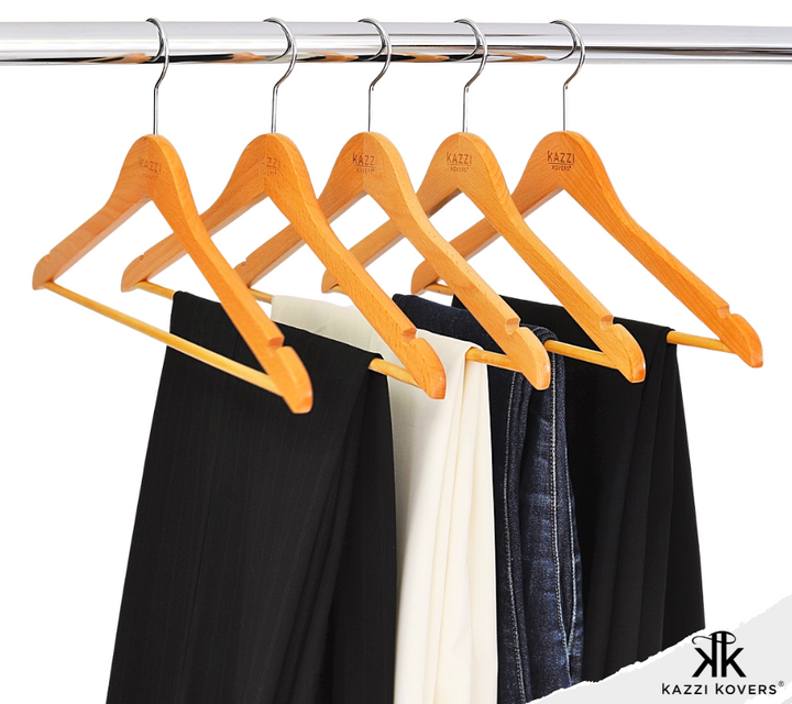 Organised jeans and pant hangers on rack