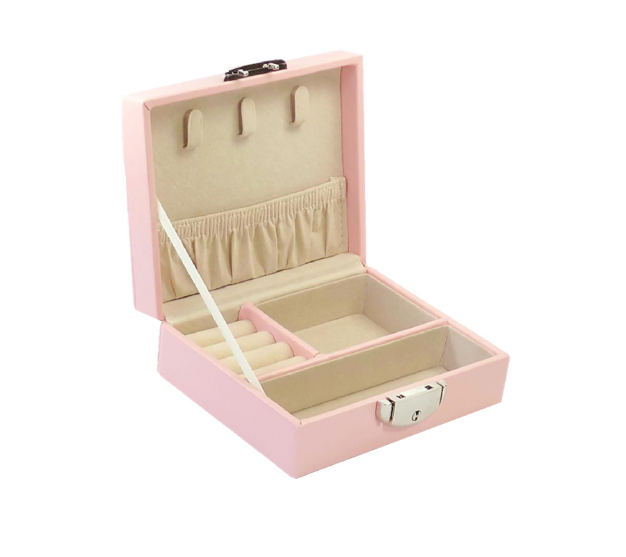 Pink jewellery case with four different compartments